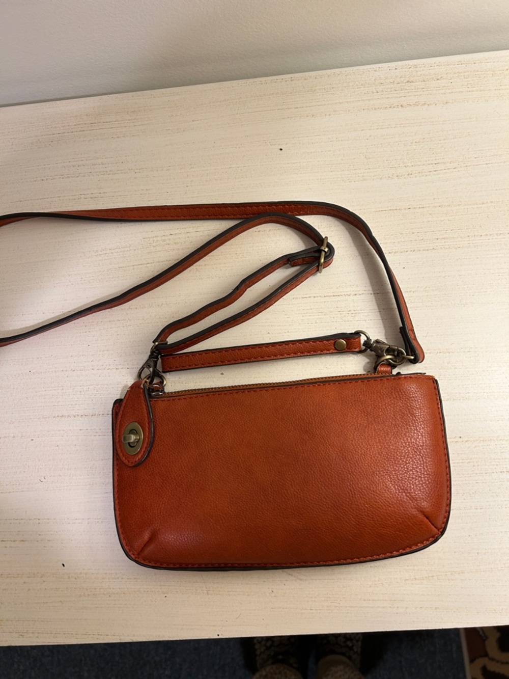 Joy Susan Orange Leather Crossbody Bag with Turn-Lock Accent